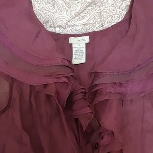 Sleeveless dress shirt.